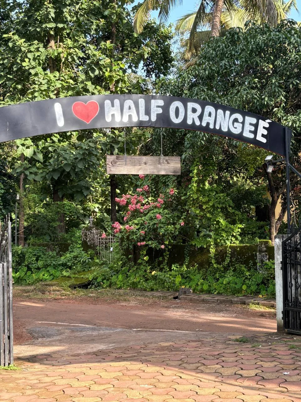 The Half Orange entrance sign on Ozran Beach Road