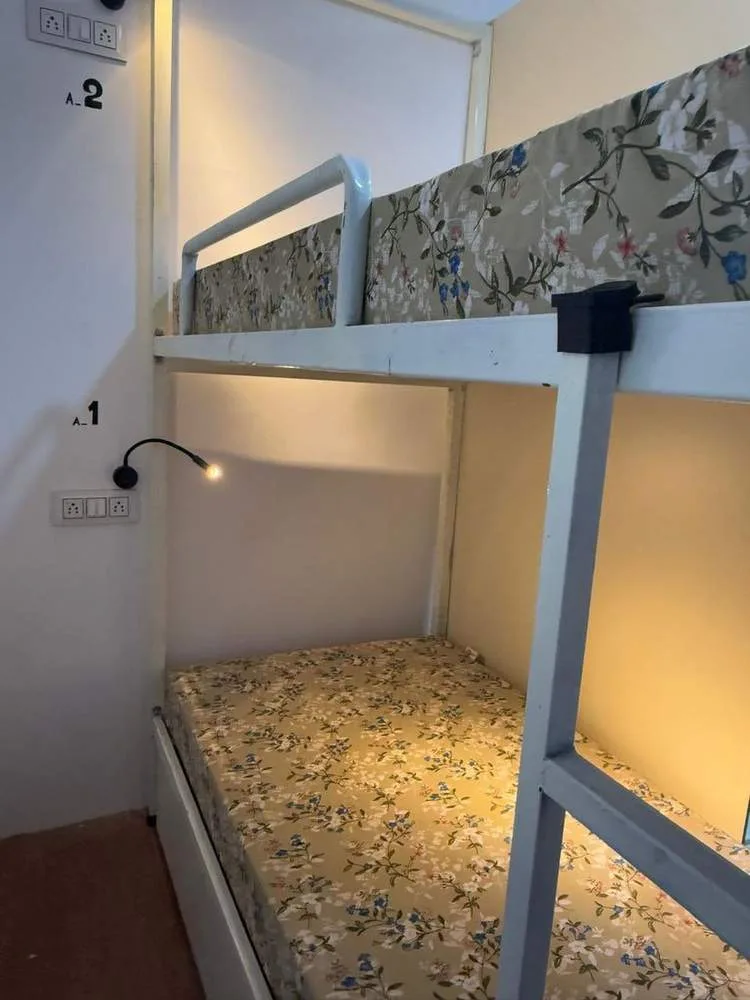 Dormitory bunk beds at Half Orange Hostel