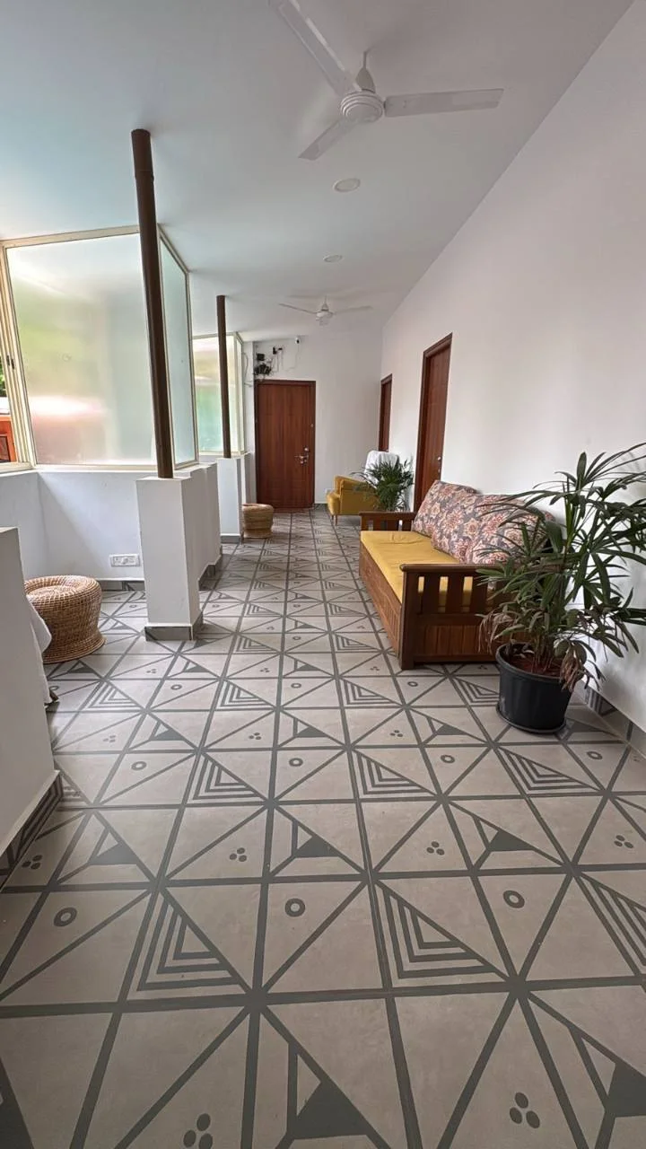 Corridor and seating area outside the private rooms at Half Orange