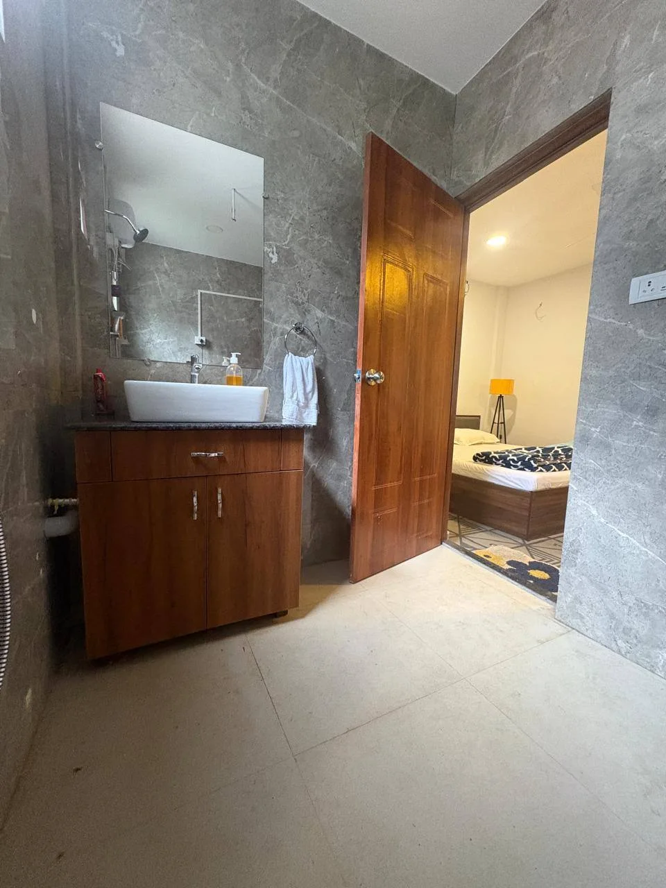 Premium Deluxe attached bathroom opening into the king-size bedroom at Half Orange